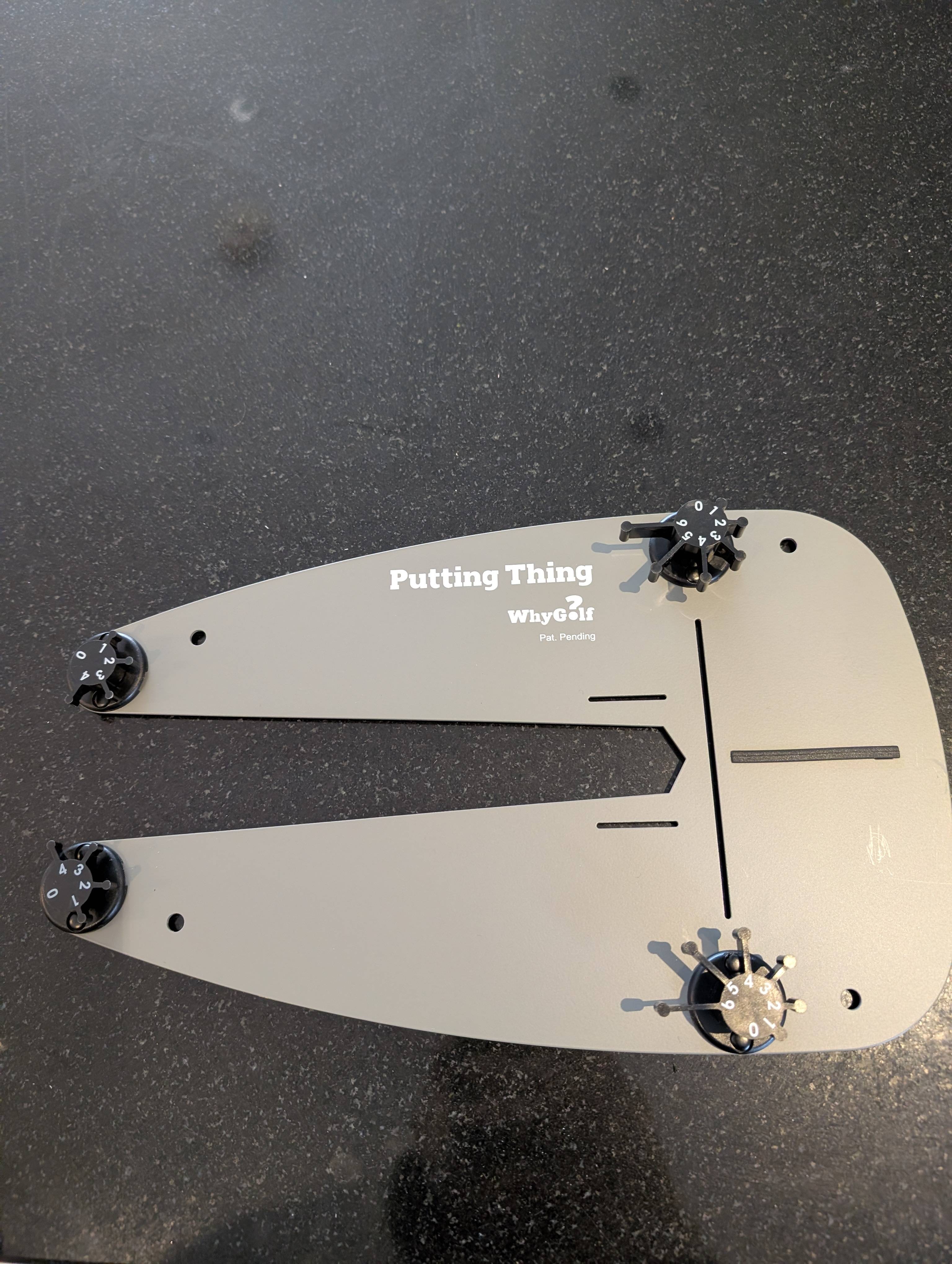 Top-down view of The Putting Thing showing gate positions and alignment lines.